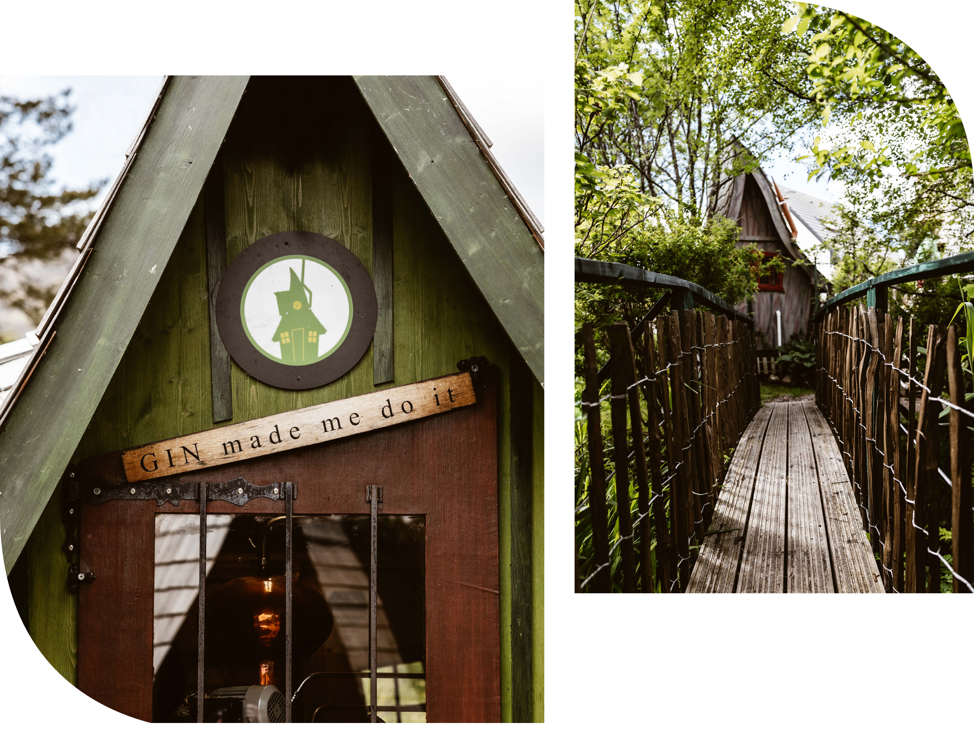 little wooden houses in a magical surrounding in the scottish highlands at fairytale distillery. Pathway to the Distillery and entrance door